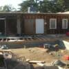 Rear of existing home along with the foundation for the addition.